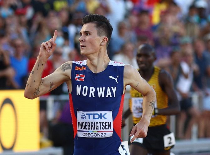 Norway's Jakob Ingebrigtsen crosses the line to win the men's 5000 metres final.