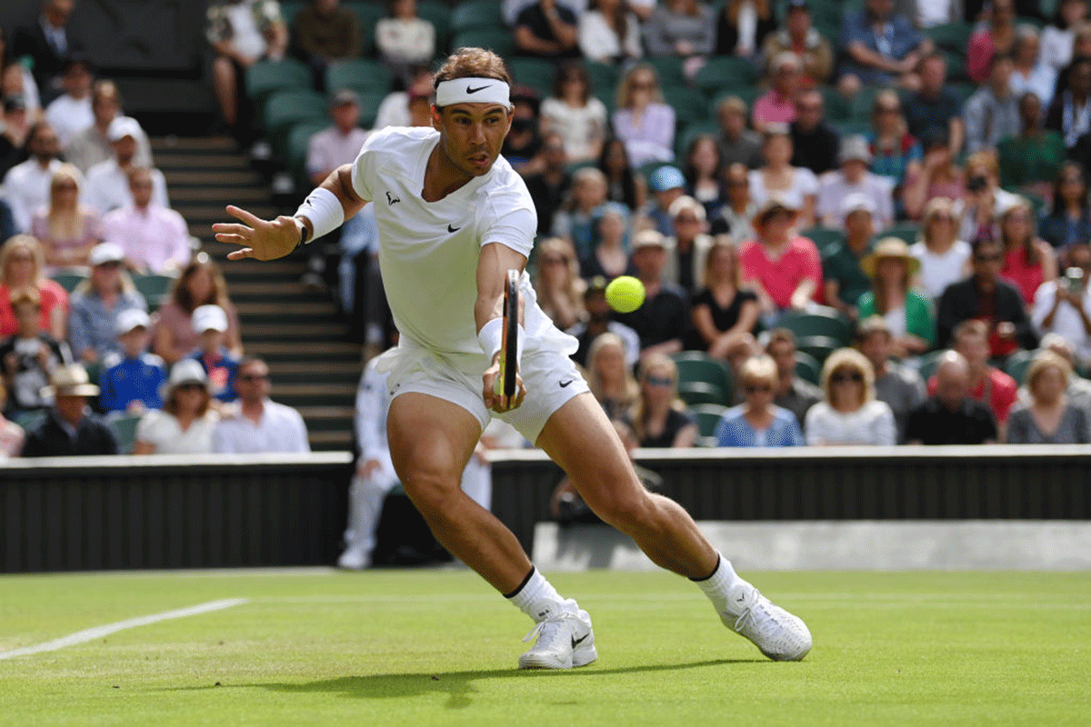 Spain's Rafael Nadal plays a backhand against of Lithuania's Ricardas Berankis