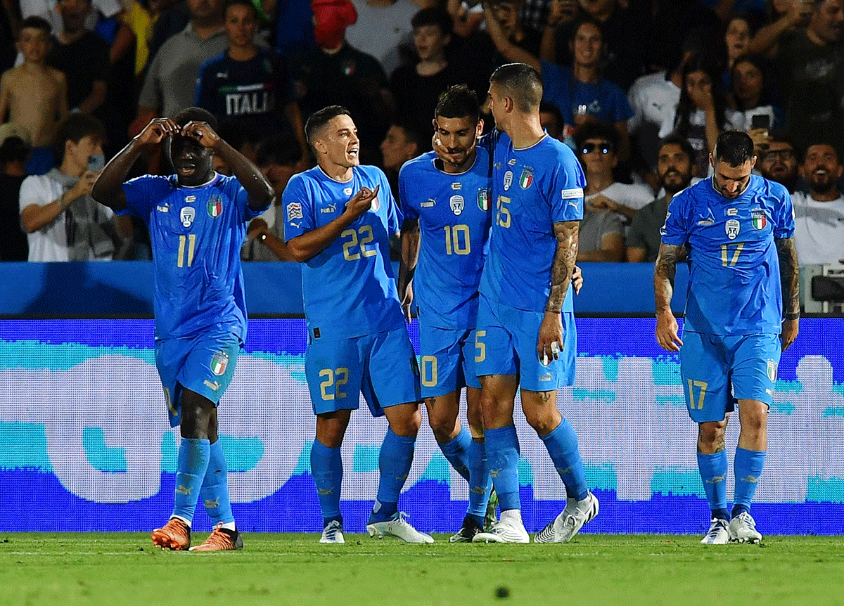 Italy's Lorenzo Pellegrini celebrates scoring their second goal against Hungary with teammates during their UEFA Nations League Group C match at Stadio Dino Manuzzi, Cesena, Italy