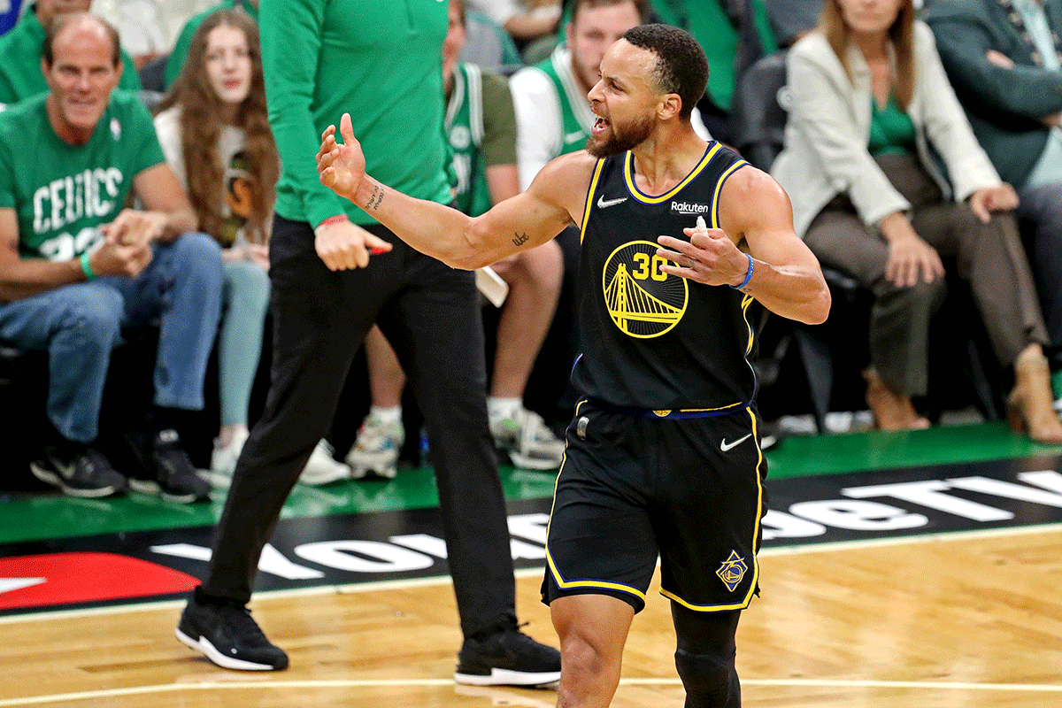 Golden State Warriors guard Stephen Curry (30) reacts after a play during the first quarter against the Boston Celtics during game four of the 2022 NBA Finals at TD Garden in Boston, Massachusetts, USA, on Friday