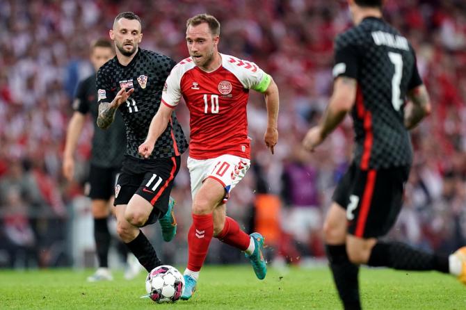 Denmark's Christian Eriksen in action with Croatia's Marcelo Brozovic 