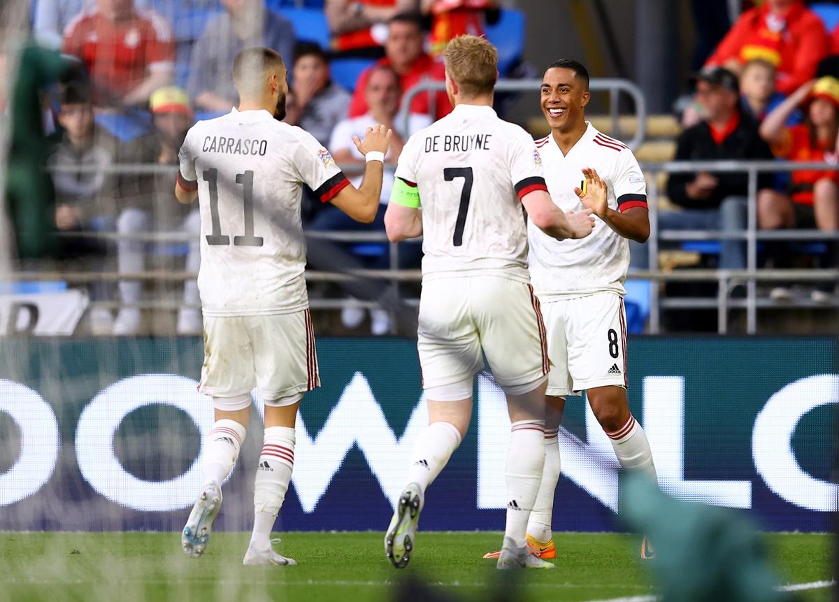 Youri Tielemans celebrates with Yannick Carrasco and Leandro Trossard after putting Belgium ahead in the match.