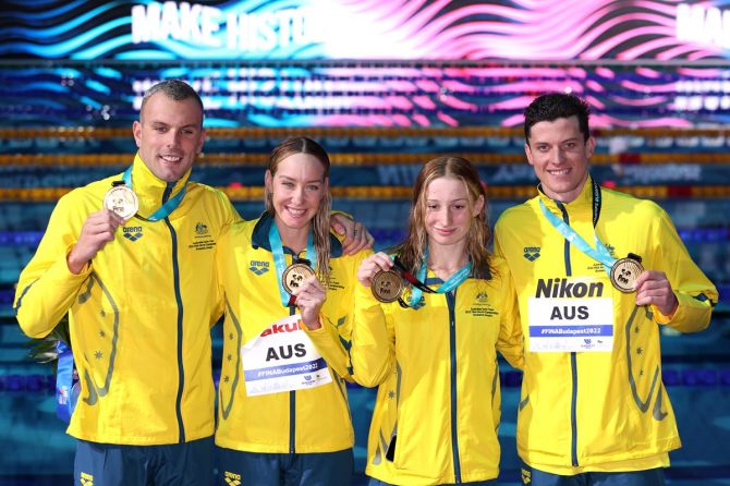 (L-R) Gold medallists Kyle Chalmers, Madison Wilson, Mollie O'Callaghan and Jack Cartwright of Australia during the medal ceremony for the 4x100m mixed relay final. 