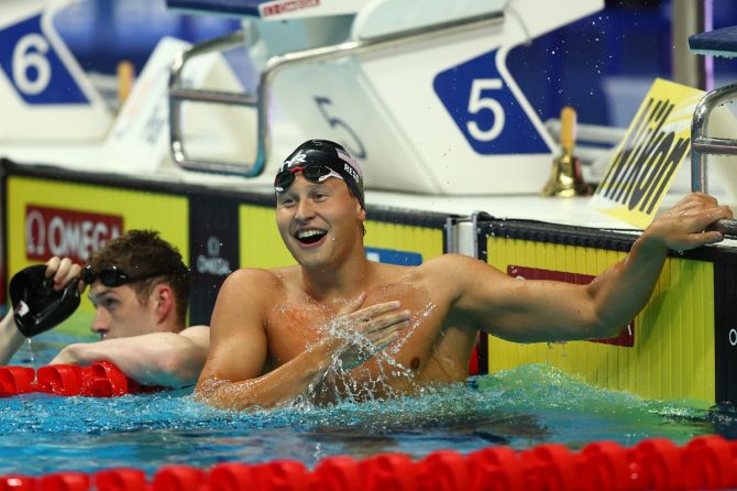 Justin Ress of the United States celebrates victory before being disqualified after competing in the men's 50m backstroke final on Day 8 of the FINA World Championships at Duna Arena in Budapest, Hungary, on Saturday.