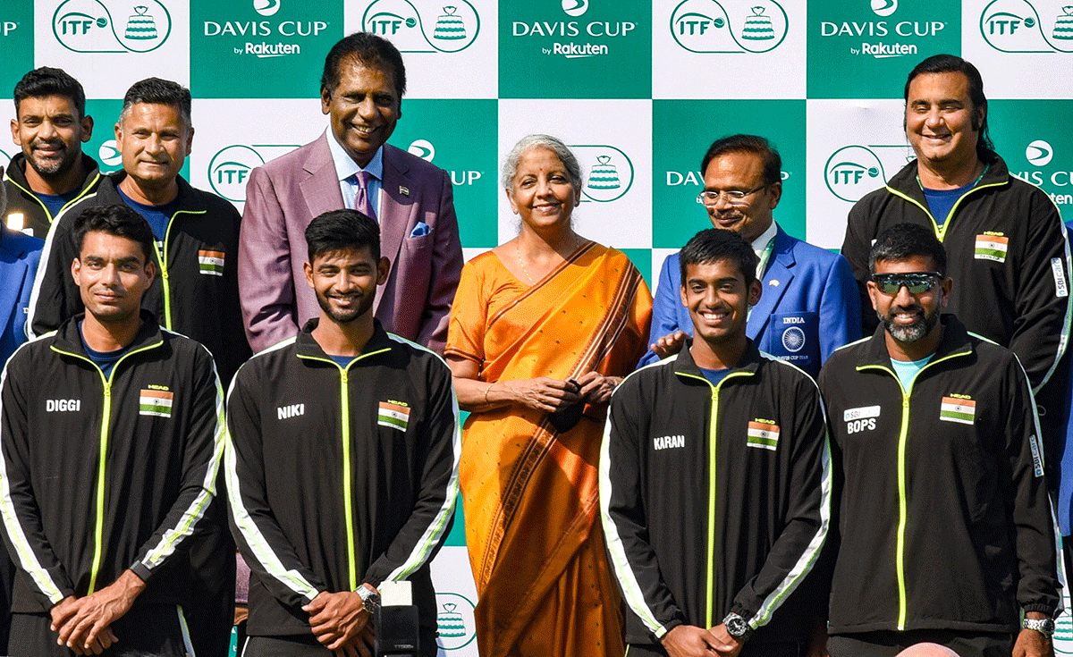 Union Finance Minister Nirmala Sitharaman with Indian tennis legend Vijay Amritraj and players and officials of the Indian Davis Cup team during the Davis Cup draw ceremony in New Delhi on Thursday