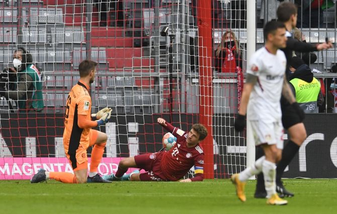 Bayern Munich's Thomas Muller scores an own goal against Bayer Leverkusen during the Bundesliga match at Allianz Arena, Munich, on Saturday.
