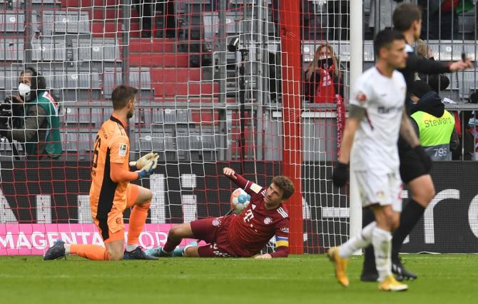 Bayern Munich's Thomas Muller scores an own goal against Bayer Leverkusen during the Bundesliga match at Allianz Arena, Munich, on Saturday.