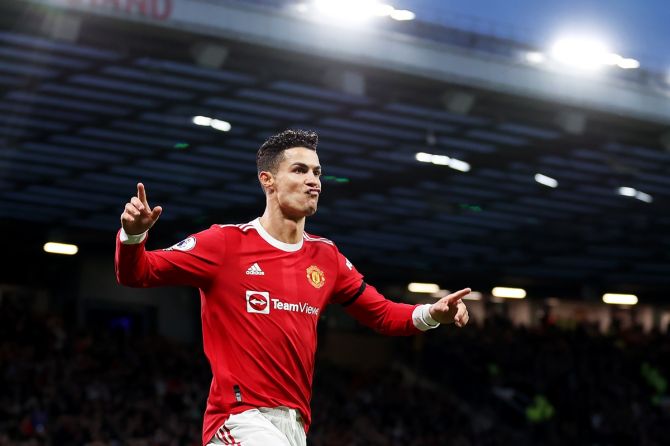 Cristiano Ronaldo celebrates scoring Manchester United's second goal during the Premier League match against Tottenham Hotspur, at Old Trafford in Manchester, on Saturday.