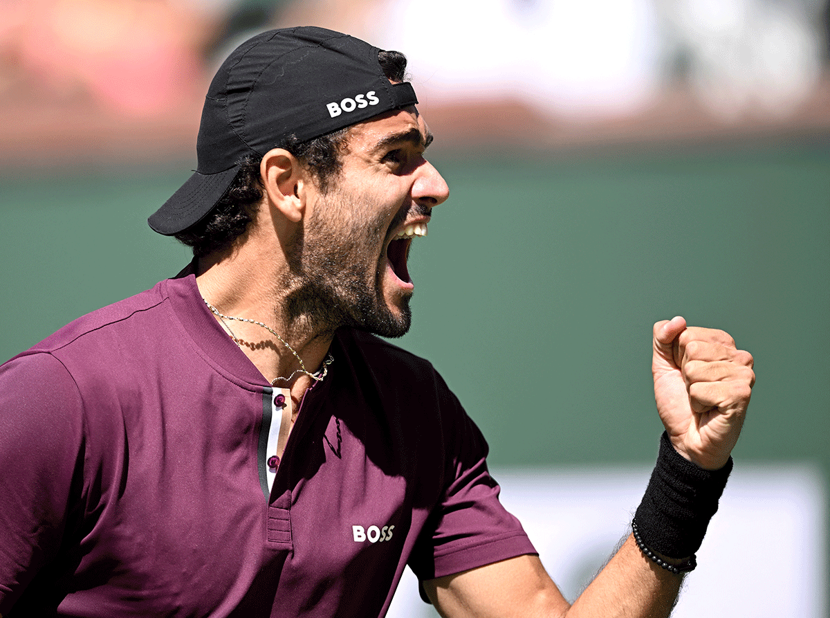 Italy's Matteo Berrettini celebrates after defeating South Africa's Lloyd Harris in his third round match at the BNP Paribas Open at the Indian Wells Tennis Garden in California, USA on Tuesday