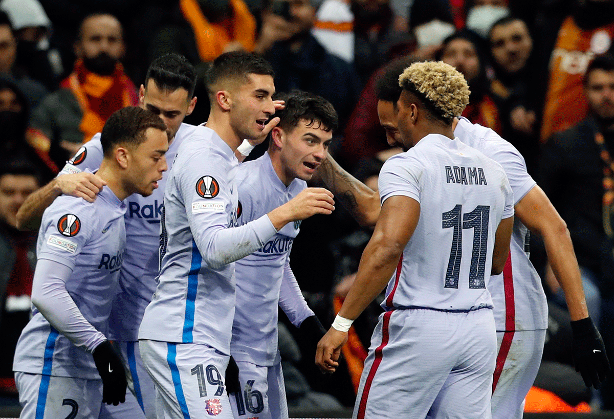 FC Barcelona's Pedri celebrates with teammates on scoring their first goal against Galatasaray at Turk Telekom Stadium, Istanbul, Turkey, on Thursday