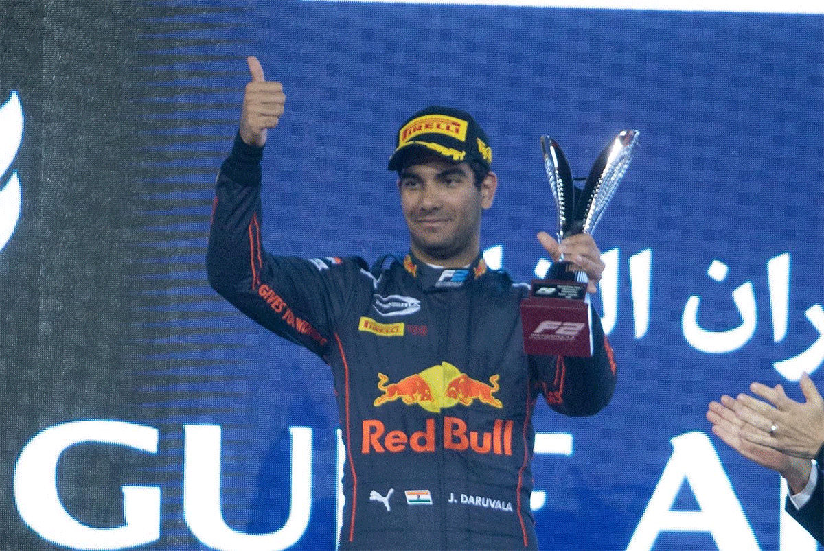 Jehan Daruvala celebrates on the podium after finishing second in the F2 race in Bahrain