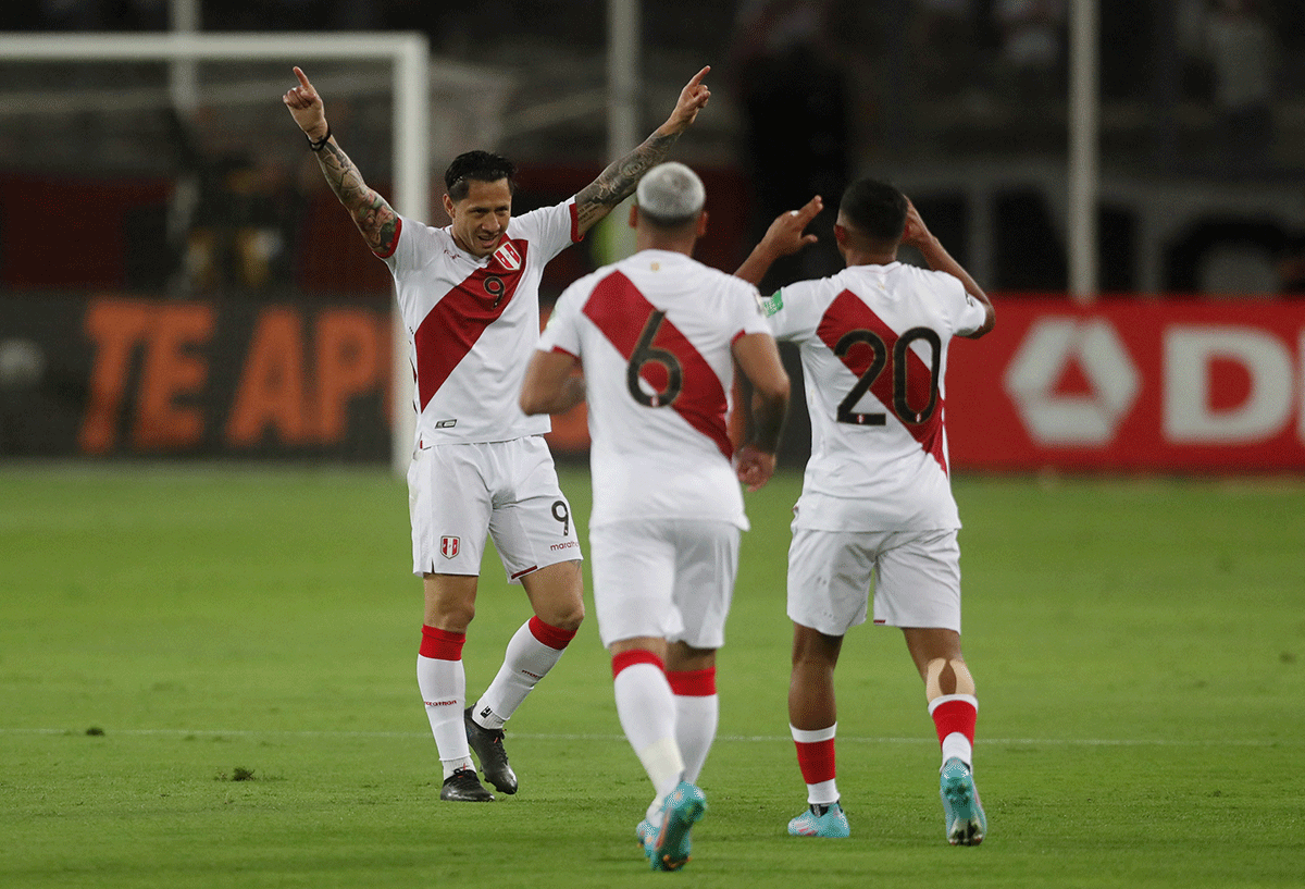 Peru's Gianluca Lapadula celebrates with teammates on scoring their first goal against Paraguay during the World Cup, South American qualifiers at Estadio Nacional, Lima, Peru 