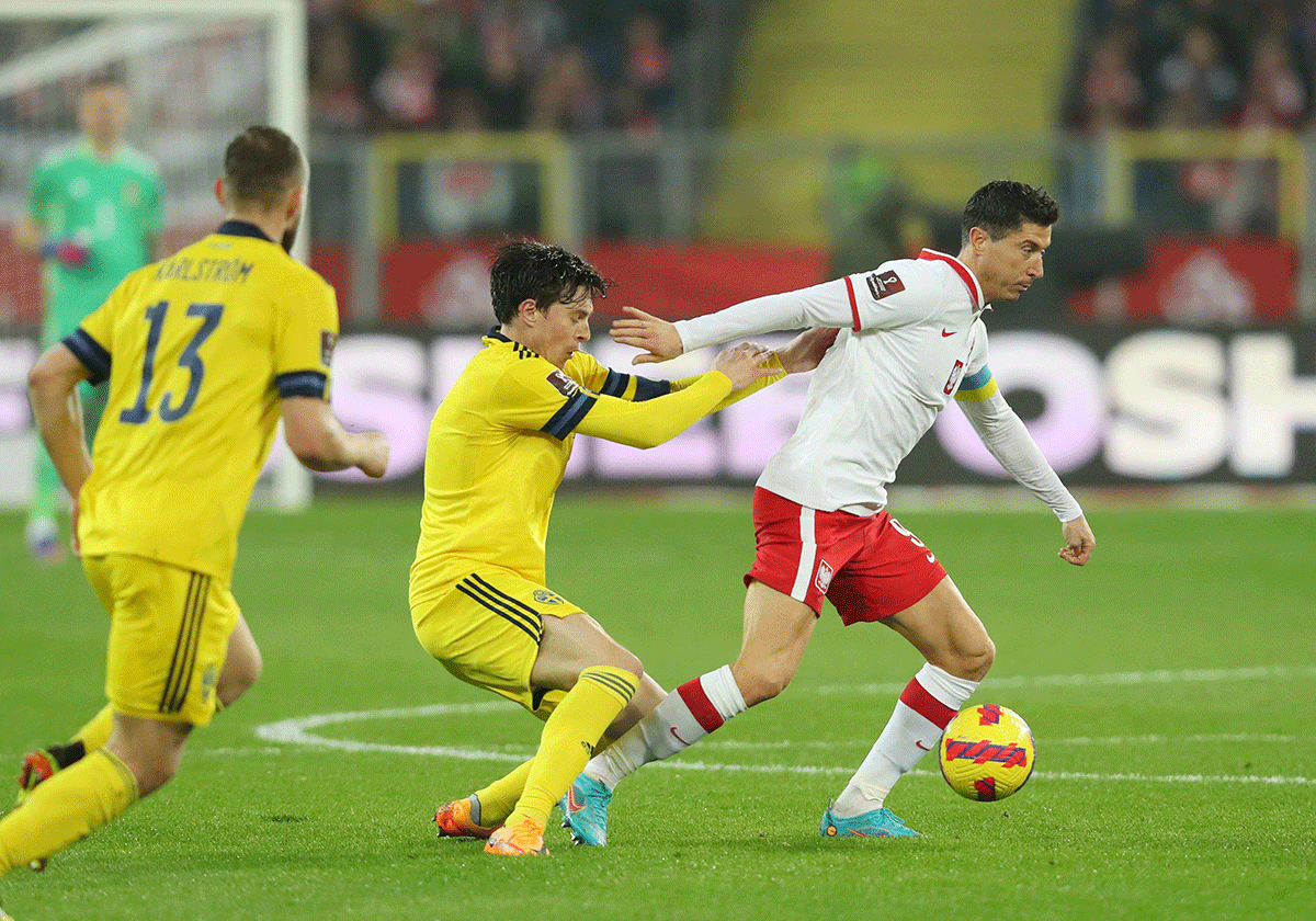 Sweden's Victor Lindelof challenges Poland's Robert Lewandowski during their World Cup Qualifiers, Path B playoff final at Silesian Stadium, Chorzow, Poland 