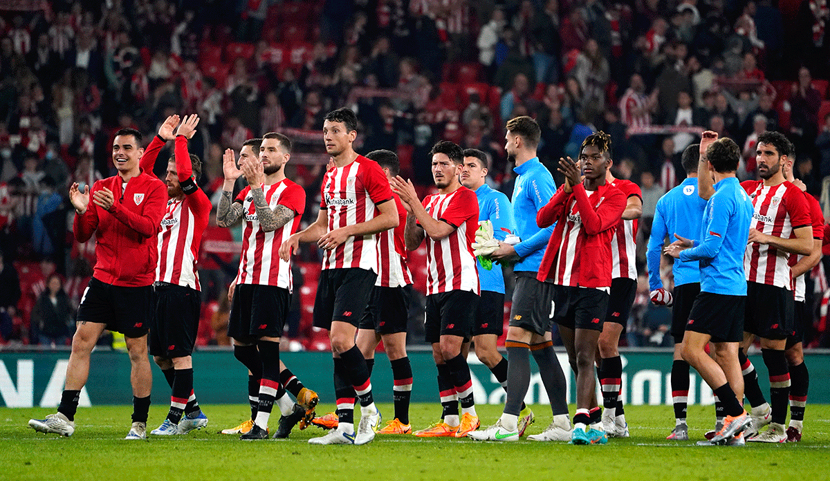 Athletic Bilbao players applaud fans after their victory over Atletico Madrid at San Mames, Bilbao, Spain