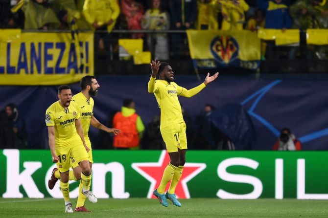 Boulaye Dia celebrates with Francis Coquelin and Raul Albiol after scoring Villarreal's first goal.