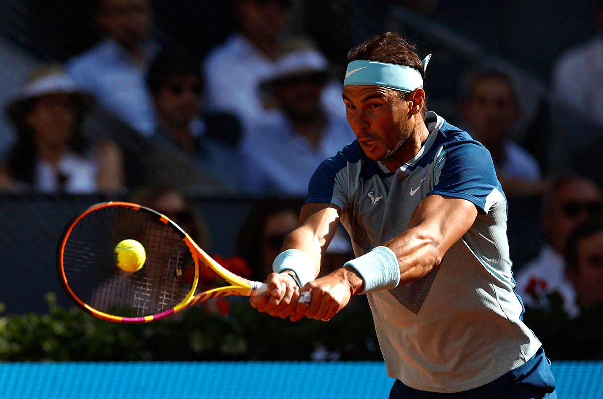 Spain's Rafael Nadal in action against compatriot Carlos Alcaraz Garfia