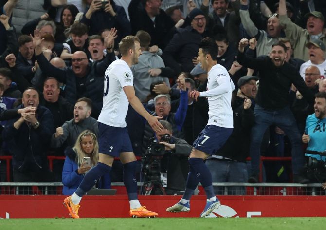 Son Heung-min celebrates with Harry Kane after putting Tottenham Hotspur ahead.