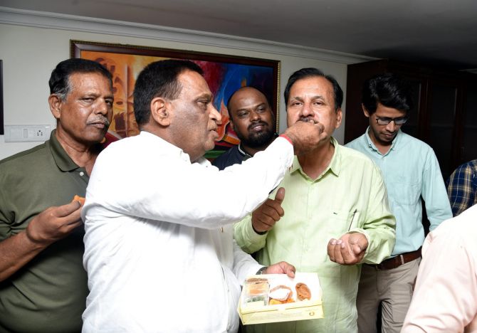 Nikhat's father being congratulated by friends and relatives in Hyderabad
