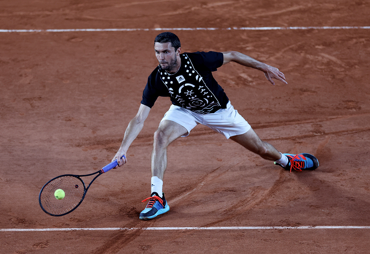 France's Gilles Simon in action during his first round match against Spain's Pablo Carreno Busta