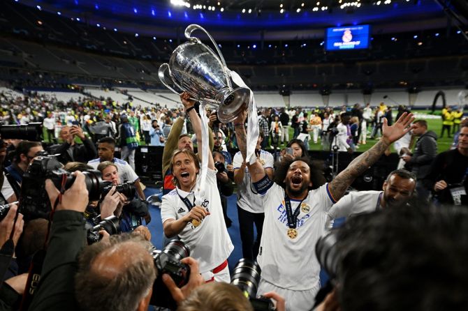 Luka Modric and Marcelo celebrate with the European Cup