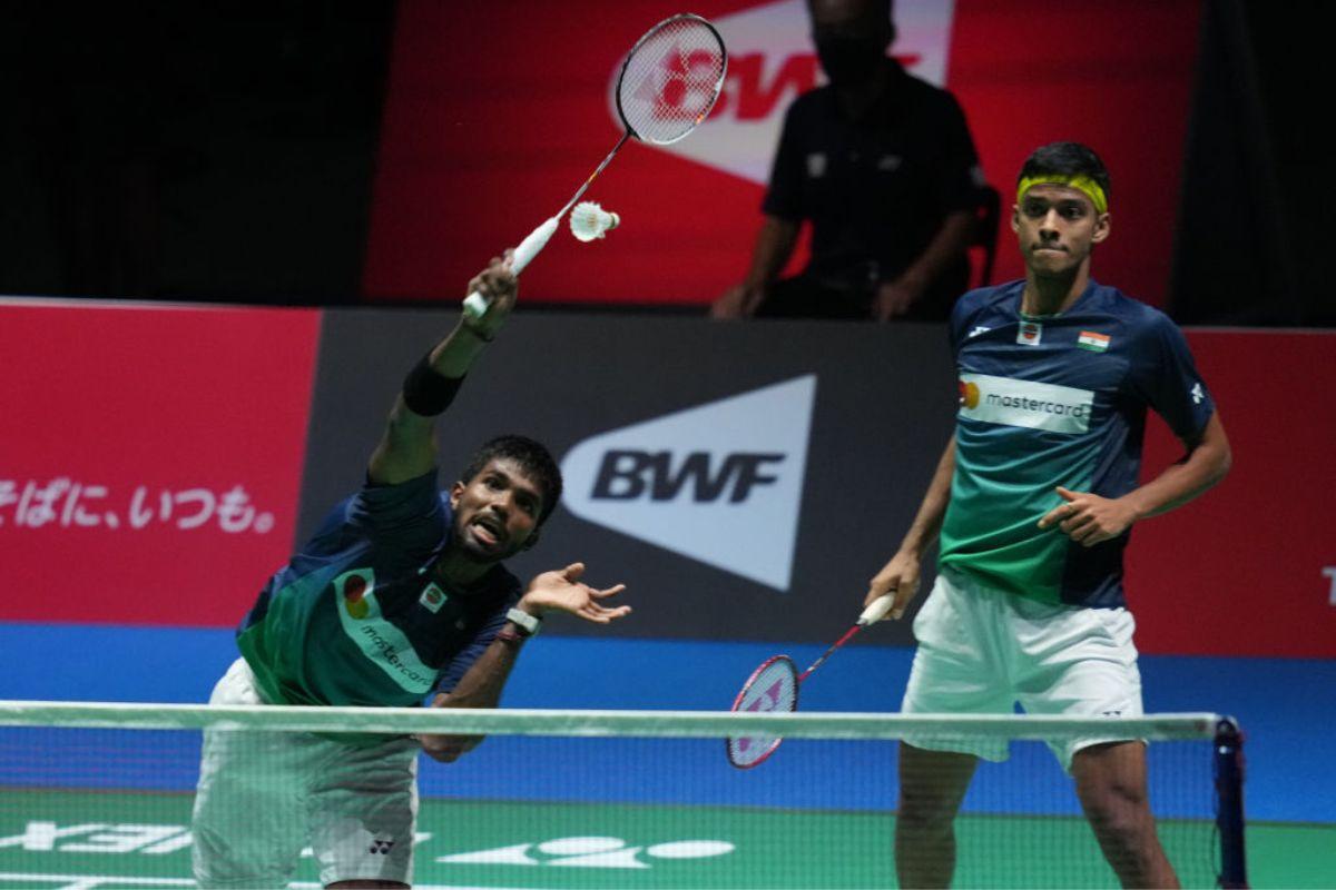 Satwiksairaj Rankireddy (L) and Chirag Shetty of India compete