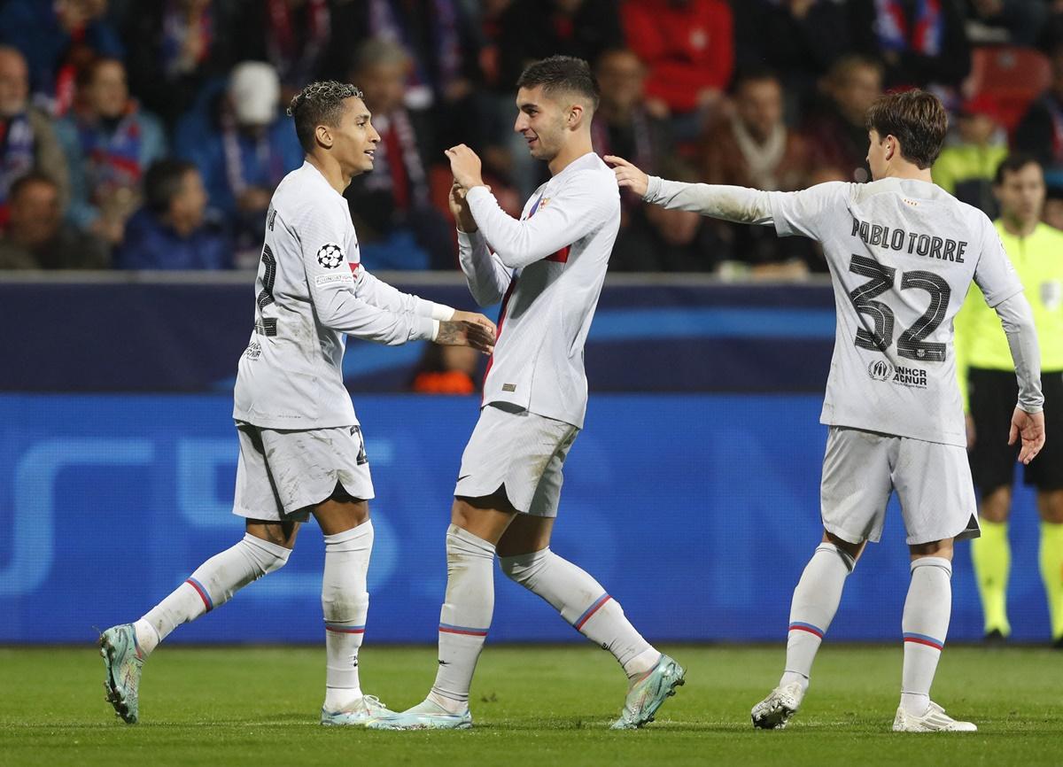 Ferran Torres celebrates scoring FC Barcelona's third goal with Raphinha during the Champions League Group C match against Victoria Plzen, at Doosan Arena, Pilsen, Czech Republic.