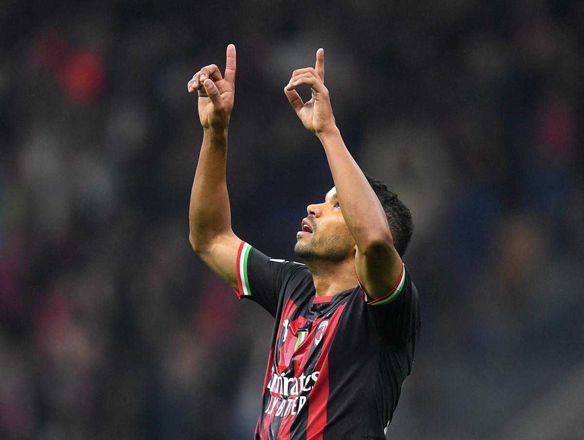 Junior Messias celebrates scoring AC Milan's fourth goal.