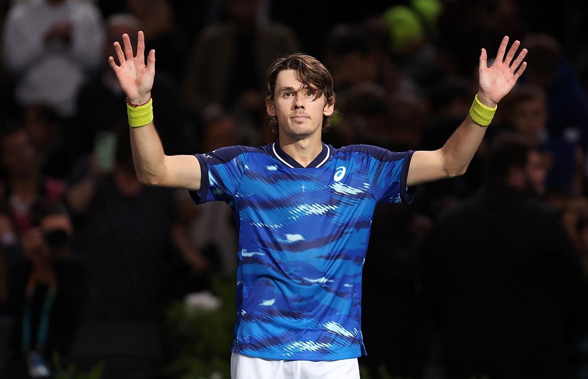 Australia's Alex De Minaur celebrates defeating Daniil Medvedev.