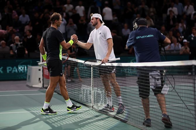 Tommy Paul of the United States is congratulated by Spain's Rafael Nadal after their second round match on Day 3 of the Paris Masters, at Palais Omnisports de Bercy in Paris, France, on Wednesday.