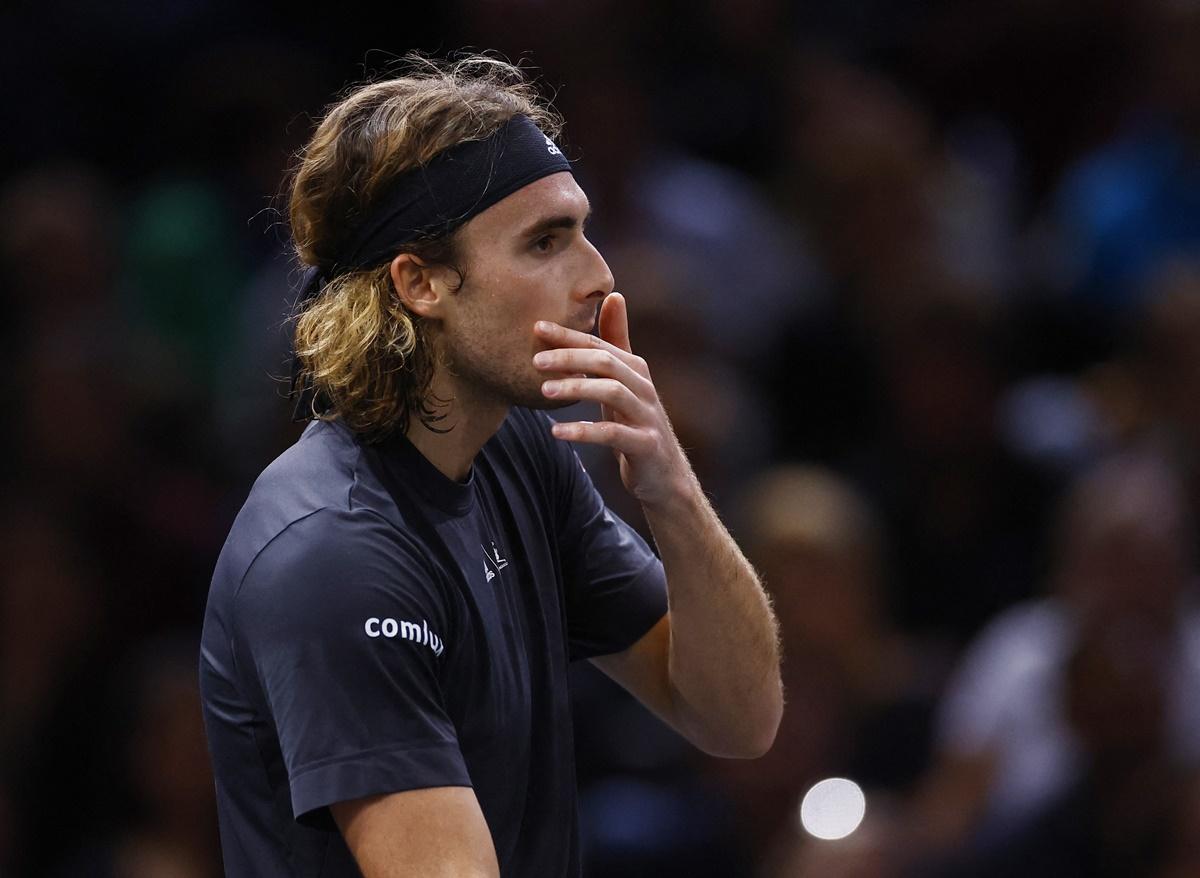 Stefanos Tsitsipas reacts after losing a point during his semi-final against Novak Djokovic.