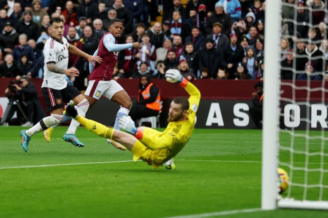 Aston Villa's Lucas Digne celebrates scoring their second goal