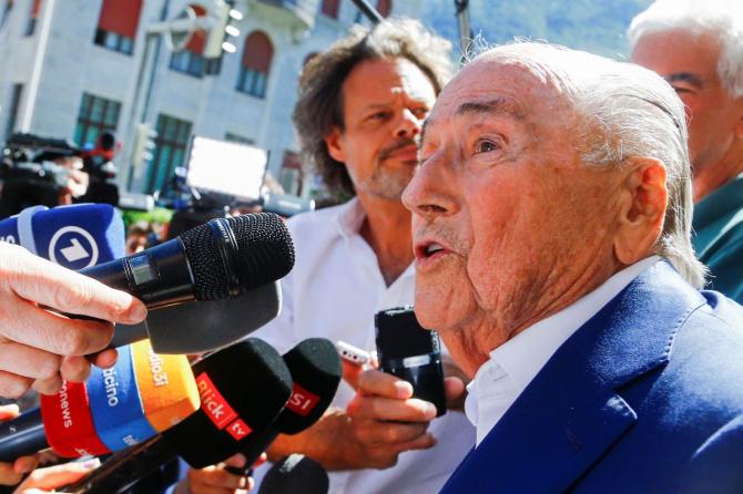 Sepp Blatter talks to the press