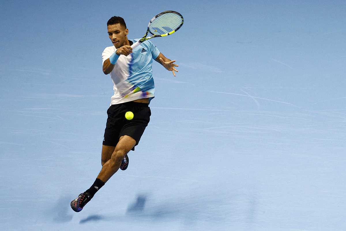 Canada's Felix Auger-Aliassime in action during his group stage match against Norway's Casper Ruud 