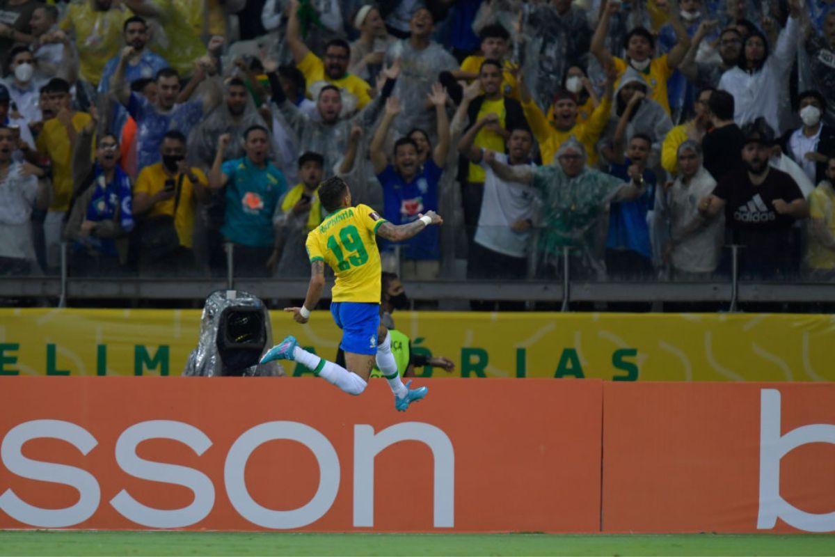 Raphinha of Brazil celebrates after scoring the opening goal during a match between Brazil and Paraguay