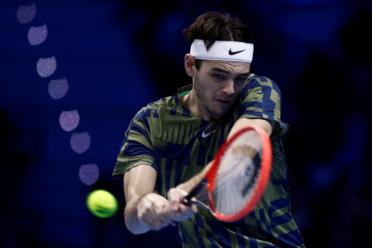 USA's Taylor Fritz in action during his group stage match against Canada's Felix Auger-Aliassime on Thursday