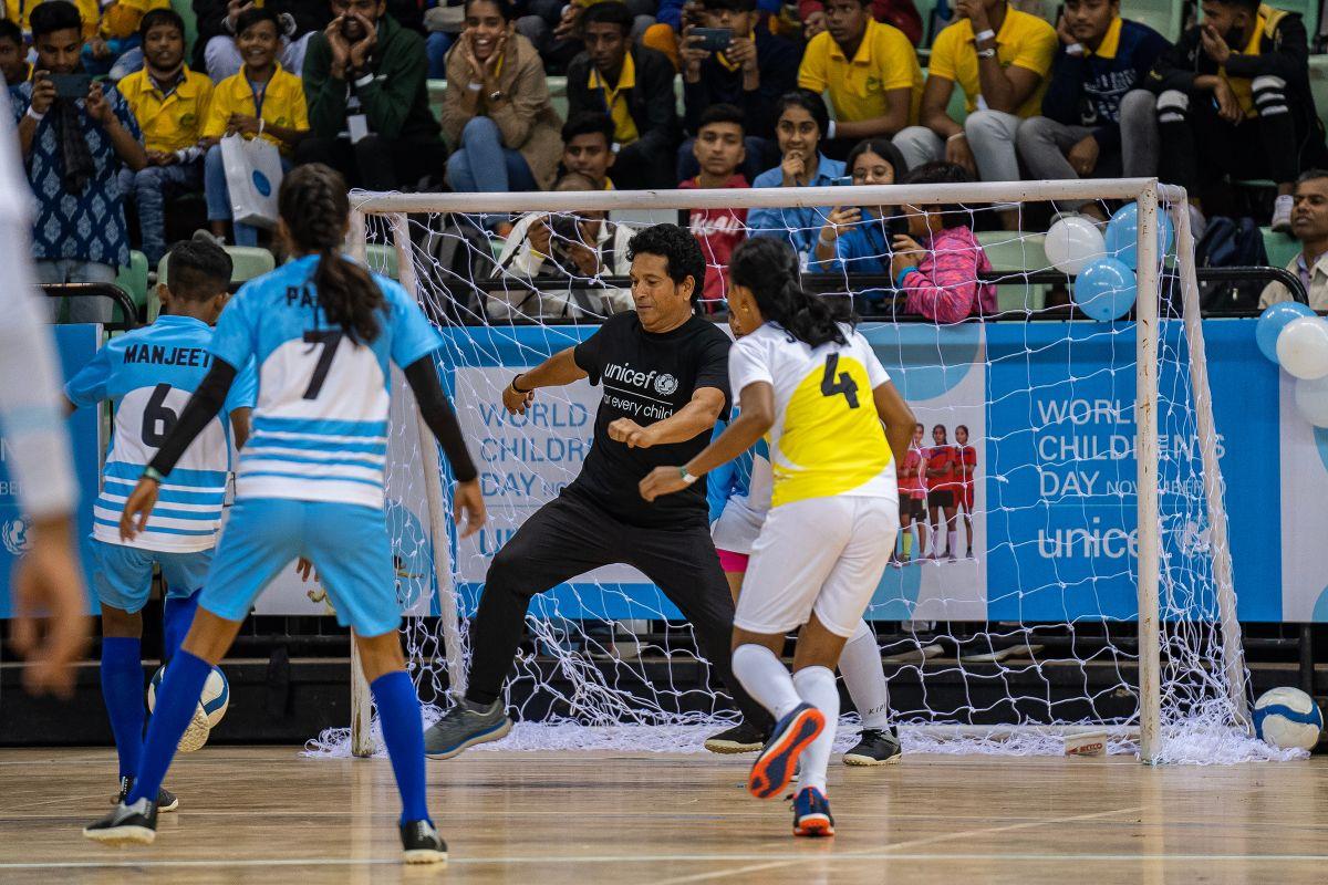 Sachin Tendulkar playing football at a UNICEF event