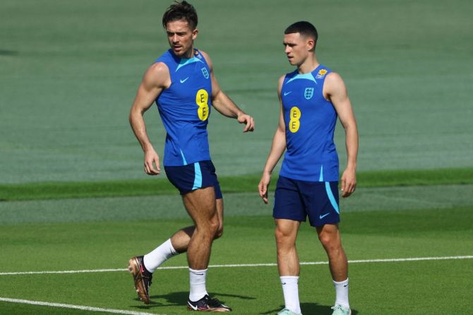 England's Jack Grealish and Phil Foden during training at the World Cup in Qatar.