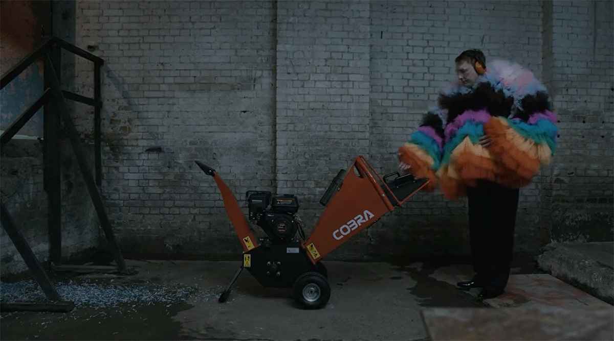 On Sunday, UK comedian Joe Lycett dressed in a rainbow dress, posted footage of him putting two stacks of 5-pound notes into a woodchipper.
