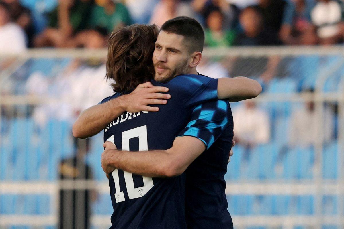 Croatia's Andrej Kramaric celebrates scoring their first goal with Luka Modric 