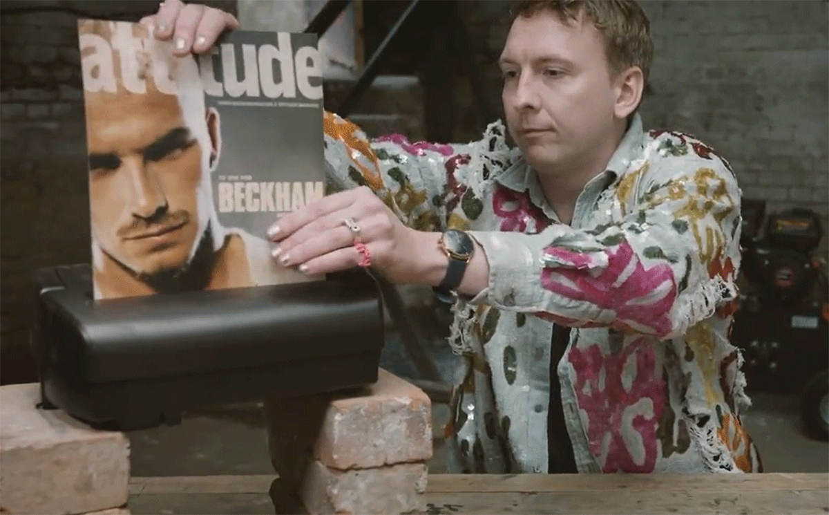 British comedian Joe Lycett shreds a cover of the 2002 edition Attitude Magazine featuring David Beckham