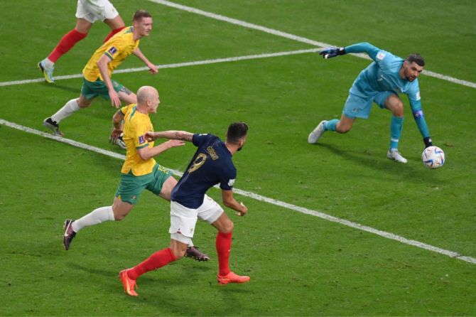 Olivier Giroud of France scores their team's second goal past Mathew Ryan of Australia