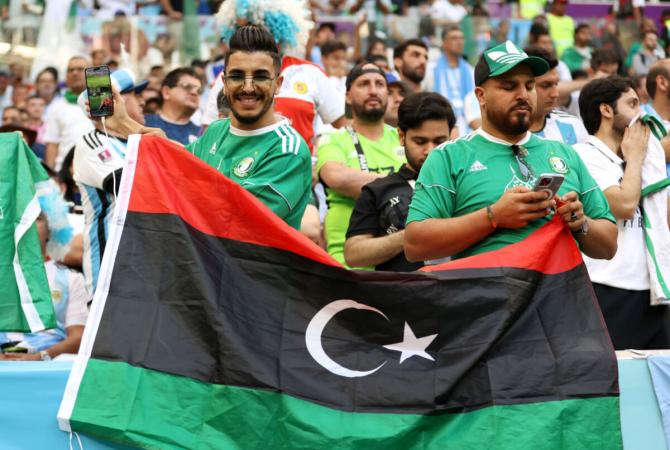 A Saudi Arabia fan celebrates their team's 2-1 victory in the FIFA World Cup Qatar 2022 Group C match between Argentina and Saudi Arabia at Lusail Stadium.