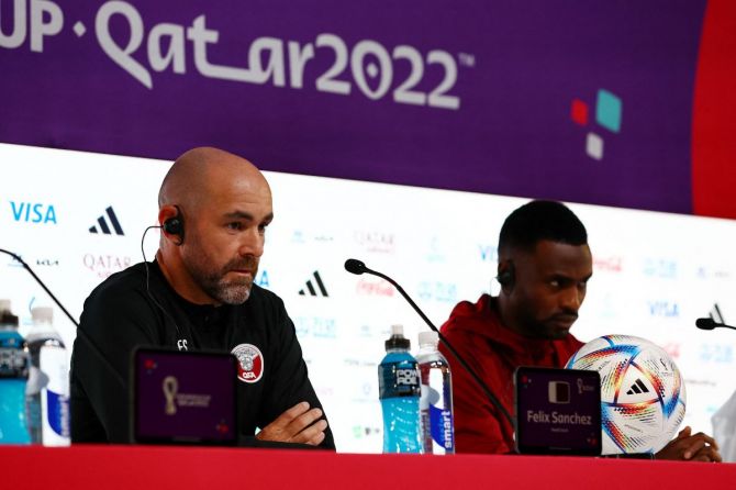 Qatar coach Felix Sanchez and Ismaeel Mohammed during the press conference