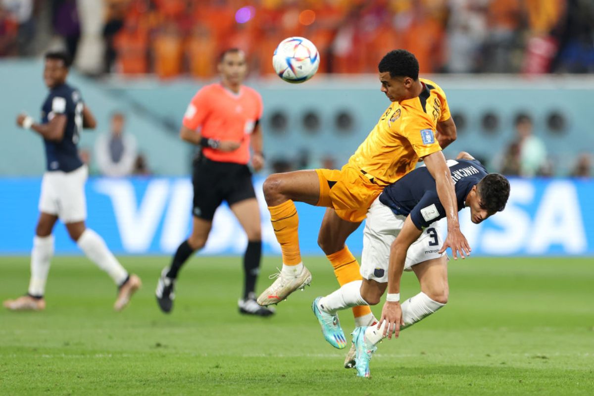 Cody Gakpo of Netherlands battles for possession with Piero Hincapie of Ecuador