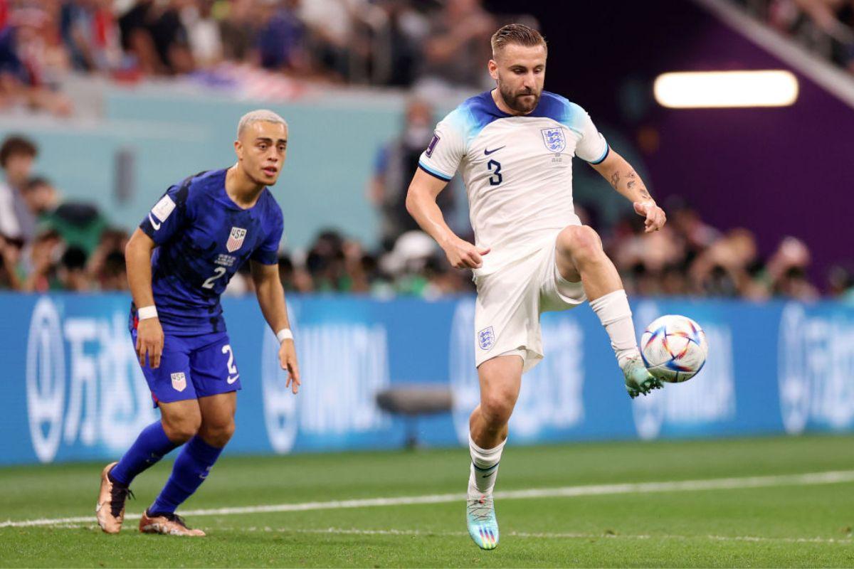 Tuke Shaw of England controls the ball under pressure of Sergino Dest of United States