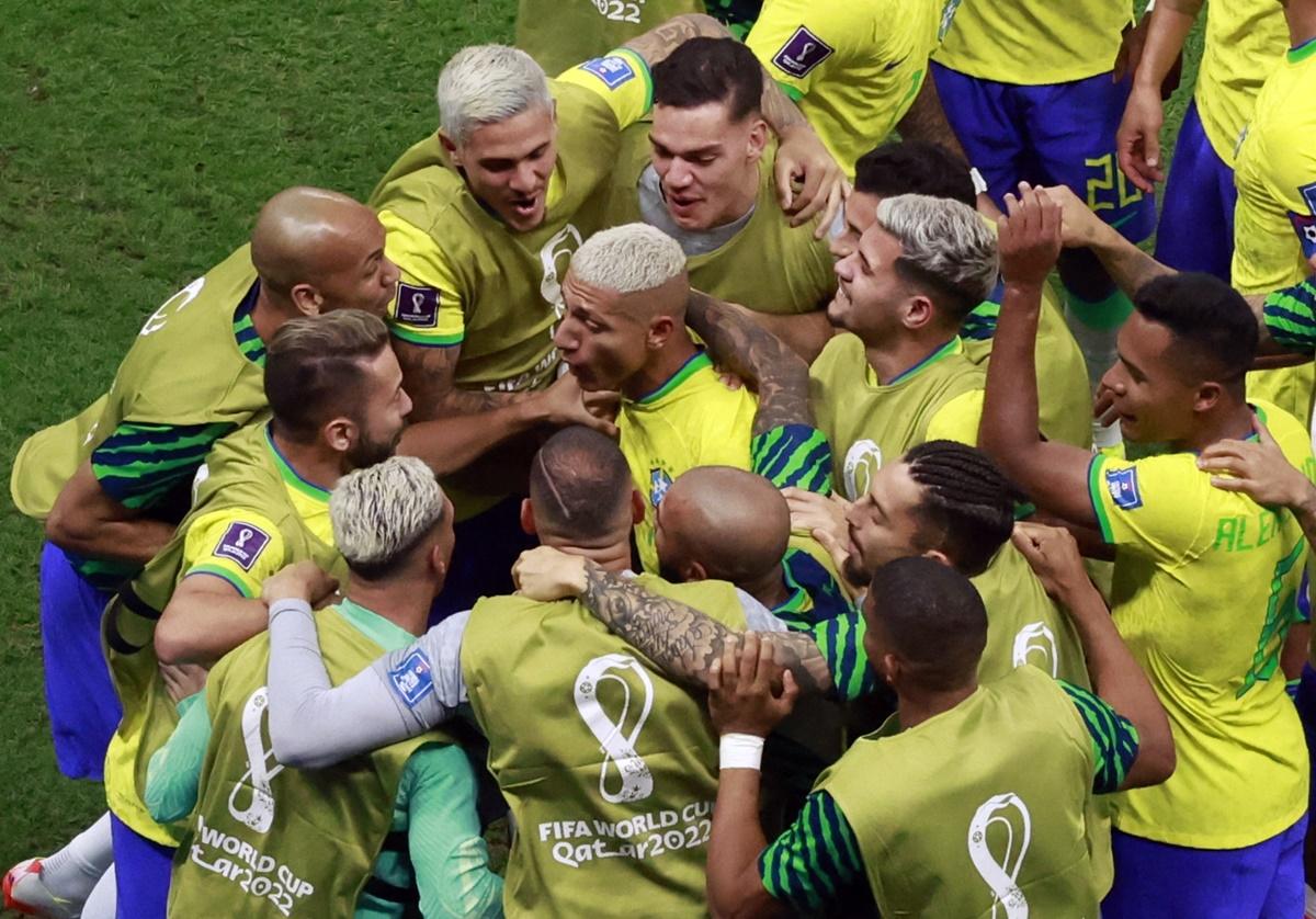 Richarlison celebrates with teammates after scoring Brazil's second goal during the FIFA World Cup Group G match against Serbia, at Lusail Stadium, Lusail, Qatar, on Thursday.