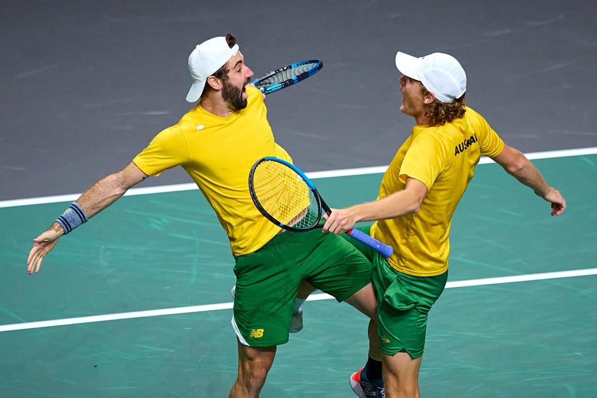 Max Purcell and Jordan Thompson celebrate victory over Croatia's Mate Pavic and Nikola Mektic to earn Australia a place in the Davis Cup final, at Palacio de los Deportes Jose Maria Martin Carpena in Malaga, Spain, on Friday.