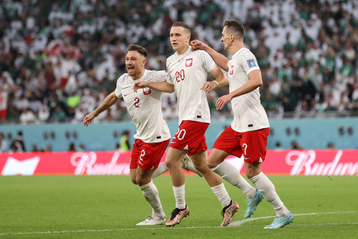 Poland's Piotr Zielinski celebrates after scoring their team's first goal