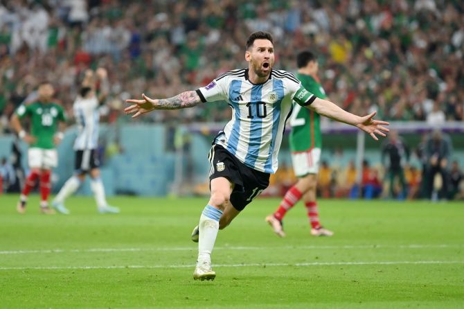 Lionel Messi launches into a celebratory run after scoring Argentina's first goal during the FIFA World Cup Group C match against Mexico, at Lusail Stadium, Qatar, on Saturday.