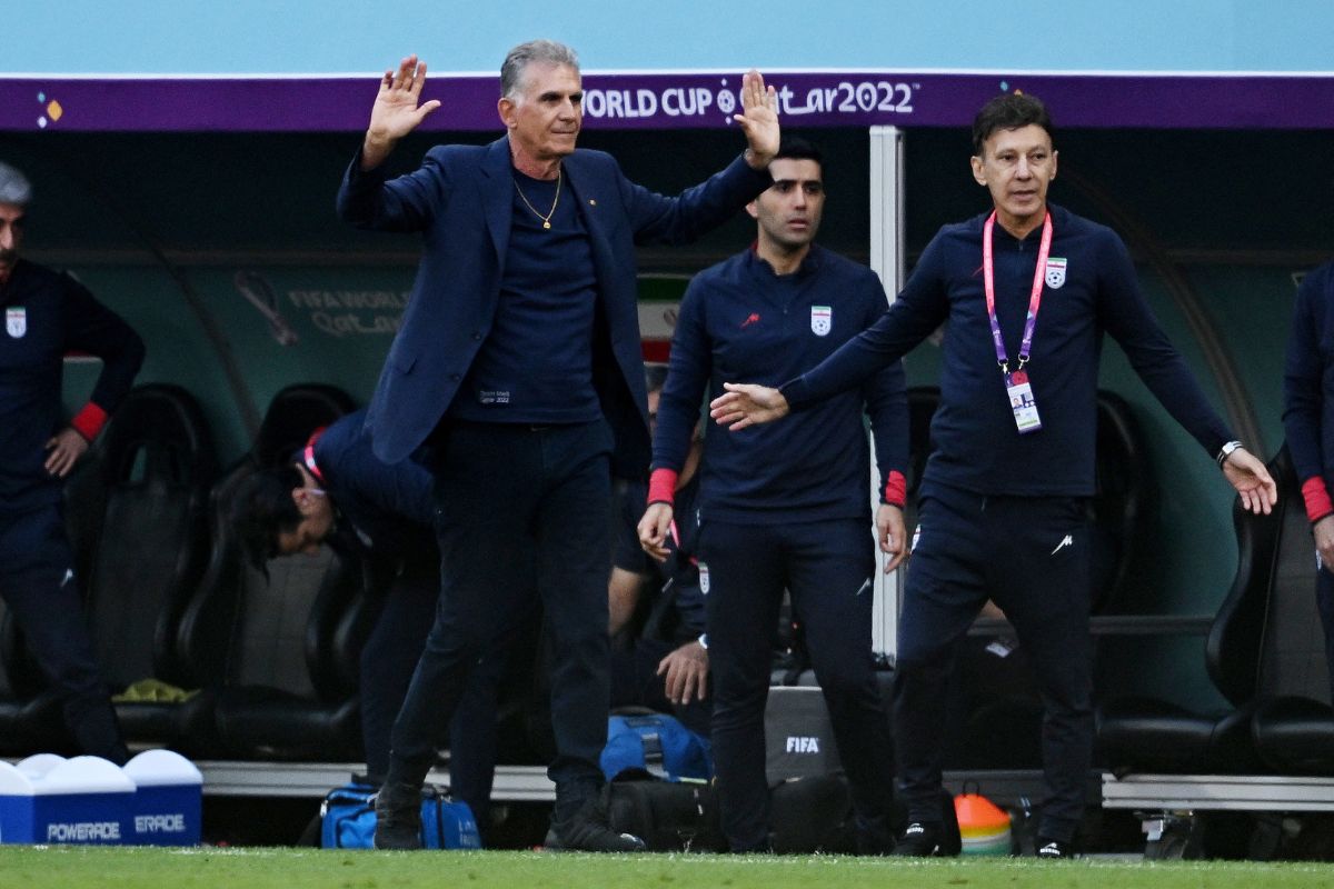  Iran coach Carlos Queiroz reacts.